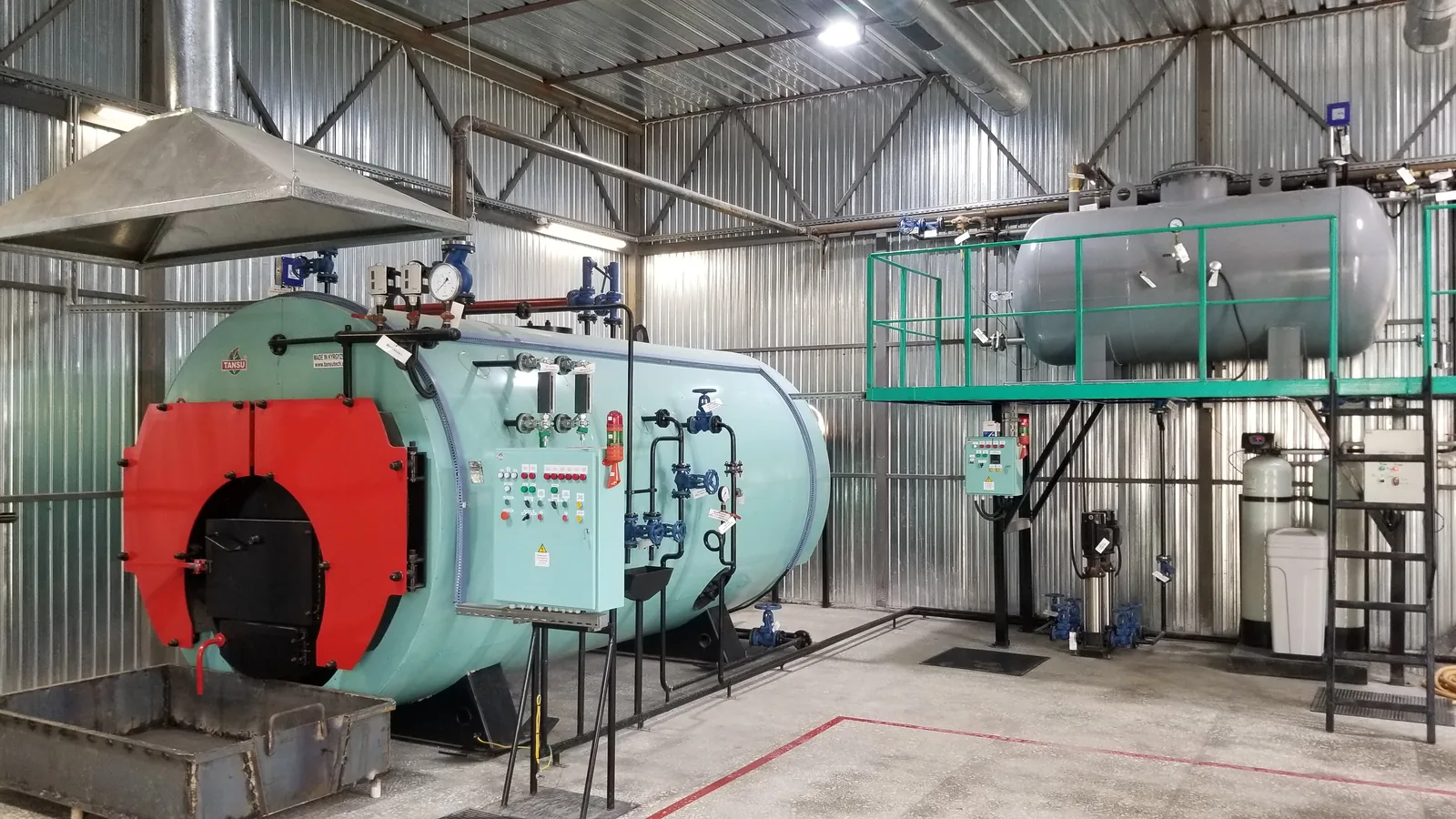 TANSU solid-fuel steam boiler in the customer's boiler house